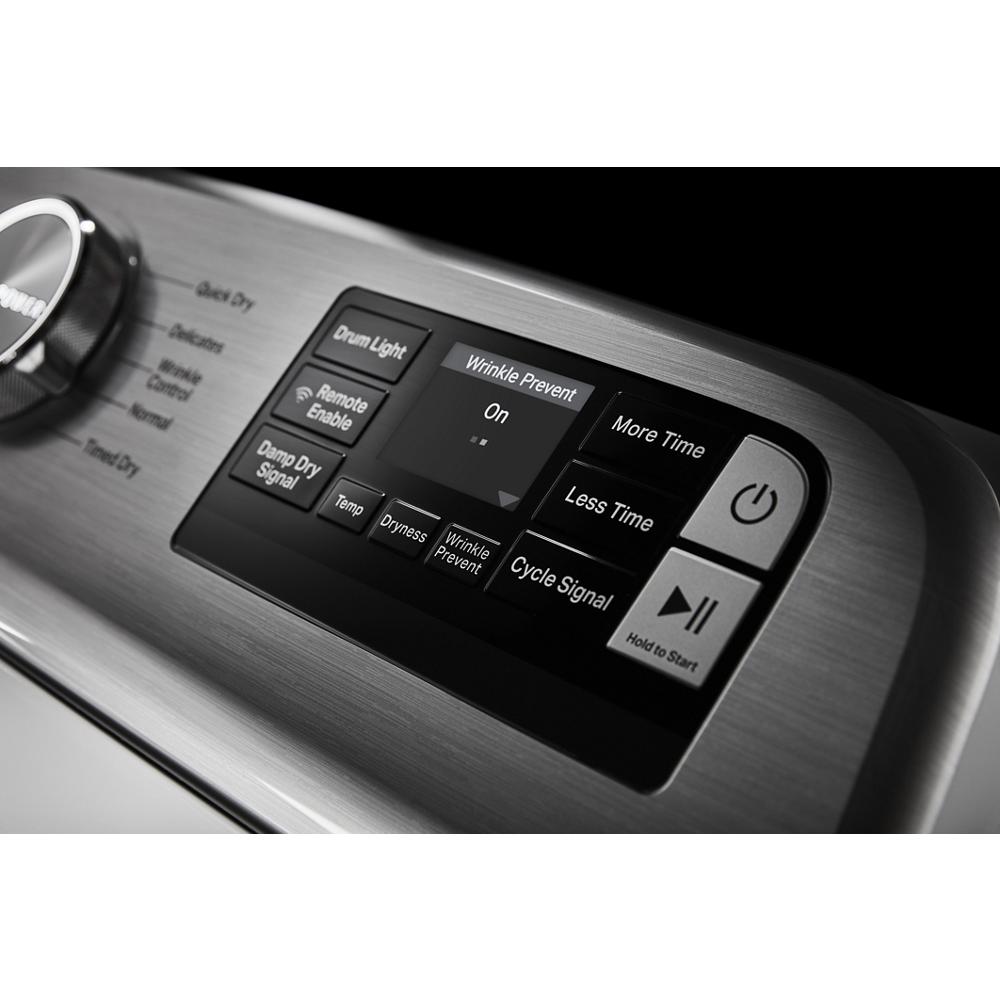 Close-up of stainless steel control panel on top load electric dryer with digital display and buttons in Dryers collection