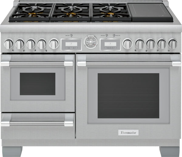 Stainless steel dual fuel range with five burners, griddle, double ovens, and front control knobs in Thermador appliances collection