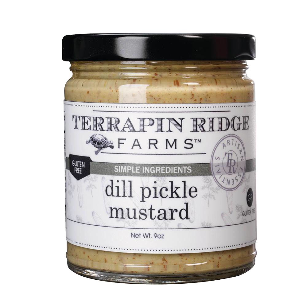 Glass jar of gluten-free dill pickle mustard with black lid, part of condiments and food & beverage collections under $50