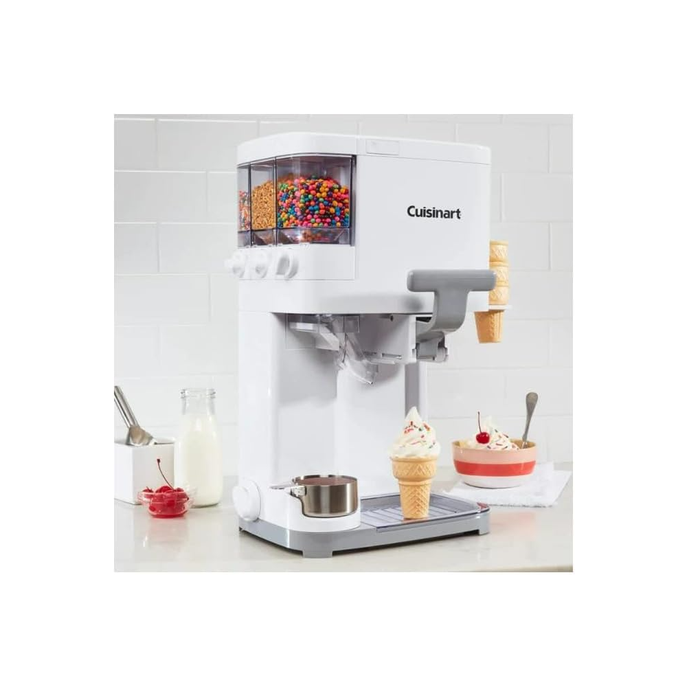 White Cuisinart soft serve ice cream maker with clear topping containers dispensing ice cream cones and cups