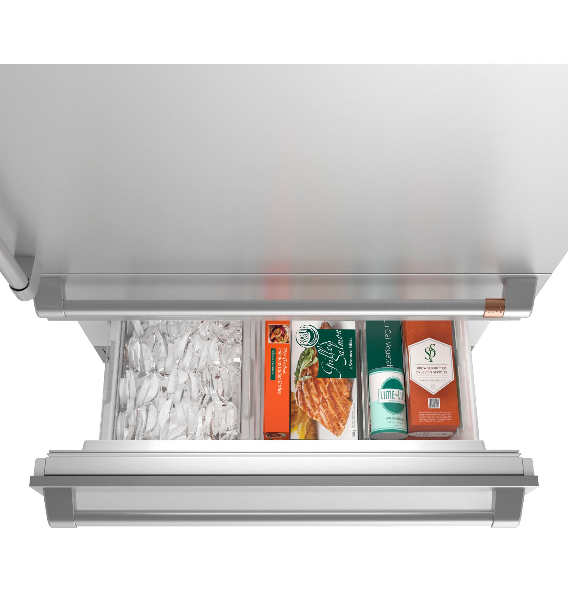 Open bottom freezer drawer with organized frozen items including ice and packaged foods from kitchen appliances collection