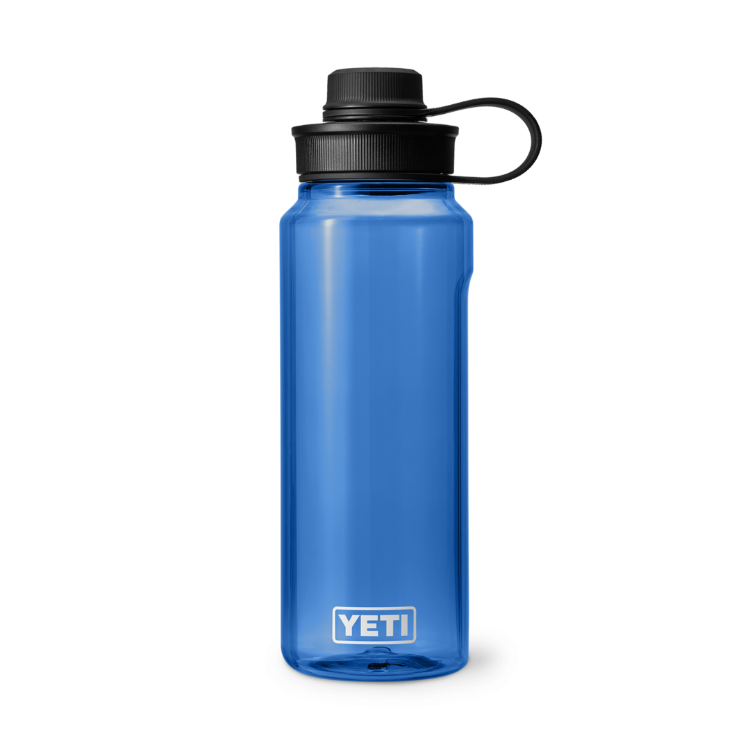 Blue 34 oz. water bottle with black tether cap, durable drinkware for kitchen, tableware, and outdoor use collections