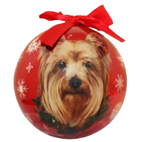 Red Christmas ornament ball featuring a realistic Yorkie dog portrait with festive wreath and snowflake designs