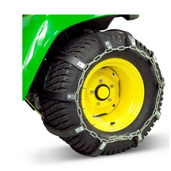 Rubber traction belts with metal chain links fitted on a green machinery tire for enhanced grip and home improvement use