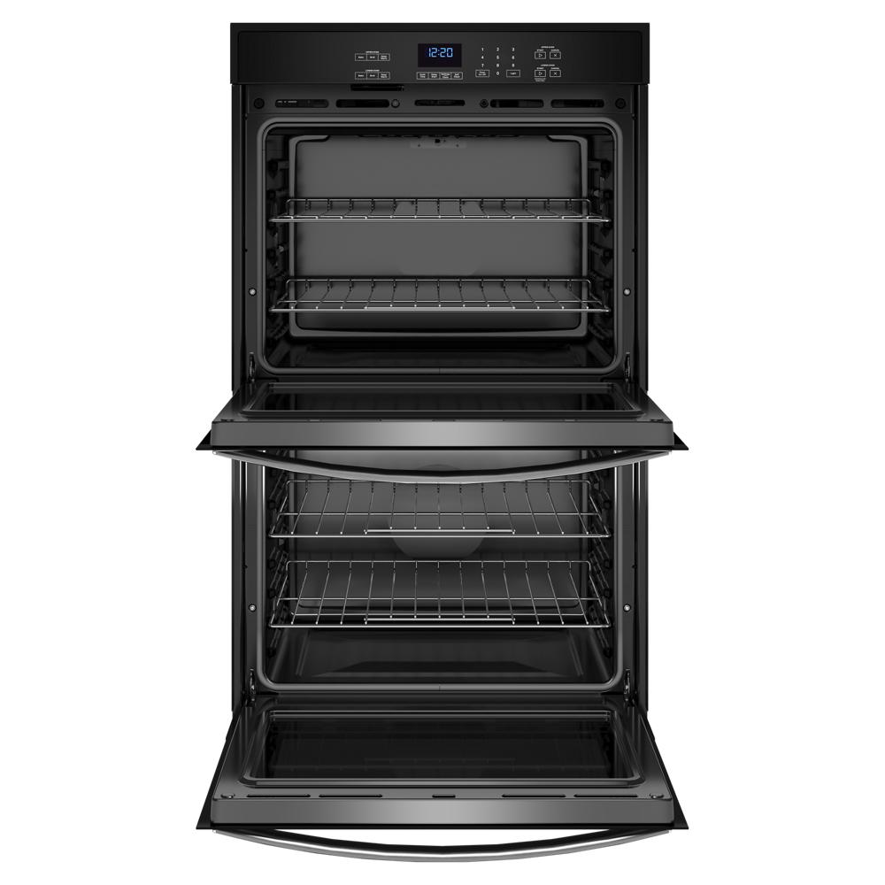 Open black double wall oven showing multiple racks and baking trays from kitchen appliances collection