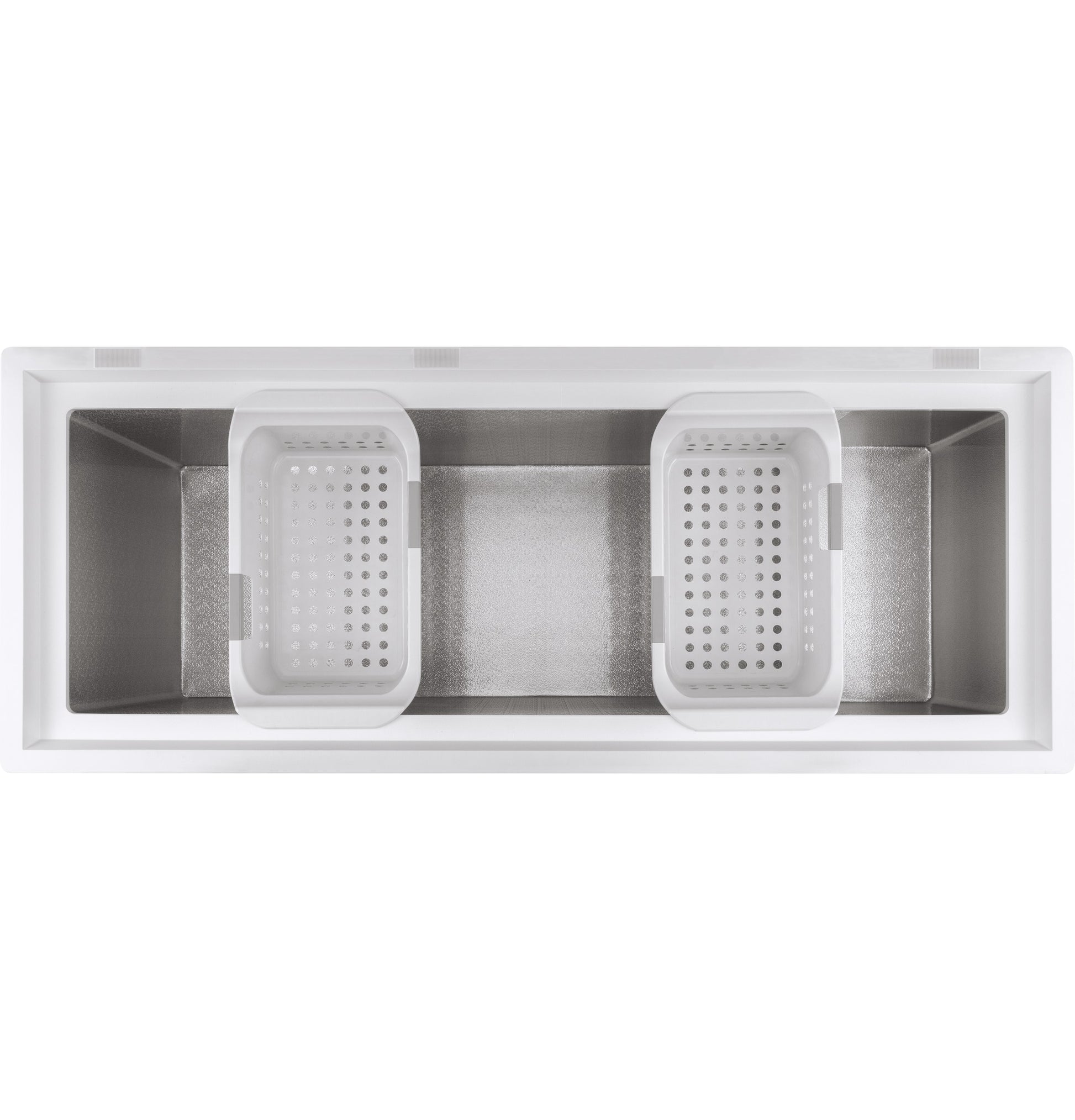 Top view of manual defrost chest freezer interior with two removable perforated storage baskets from freezers collection