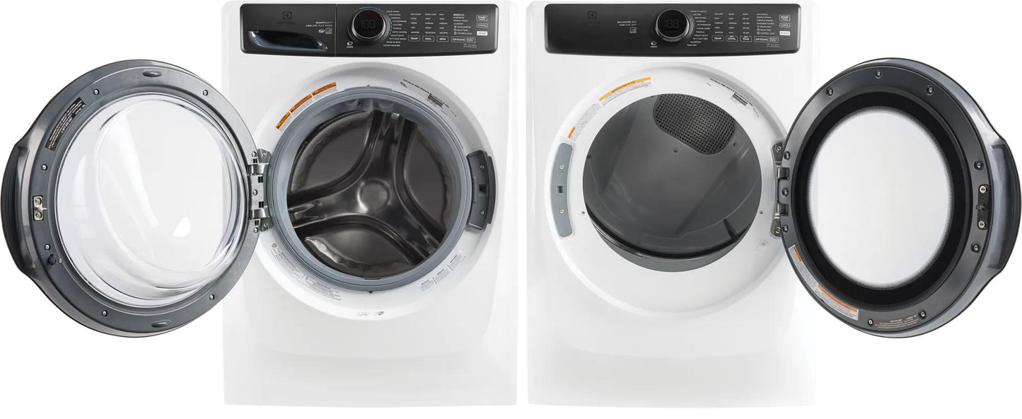 White front load washer and dryer pair with open doors and digital control panels in washers and appliances collections