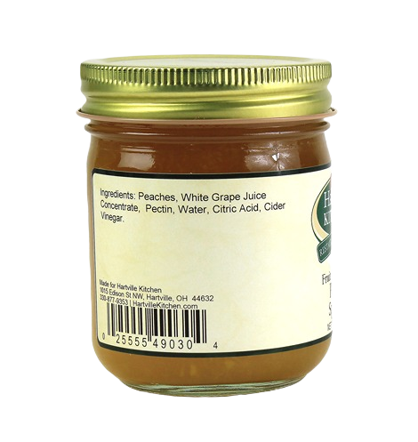 Glass jar of peach spread sweetened with fruit juice concentrate, part of Hartville Kitchen jams and jellies collection under $25