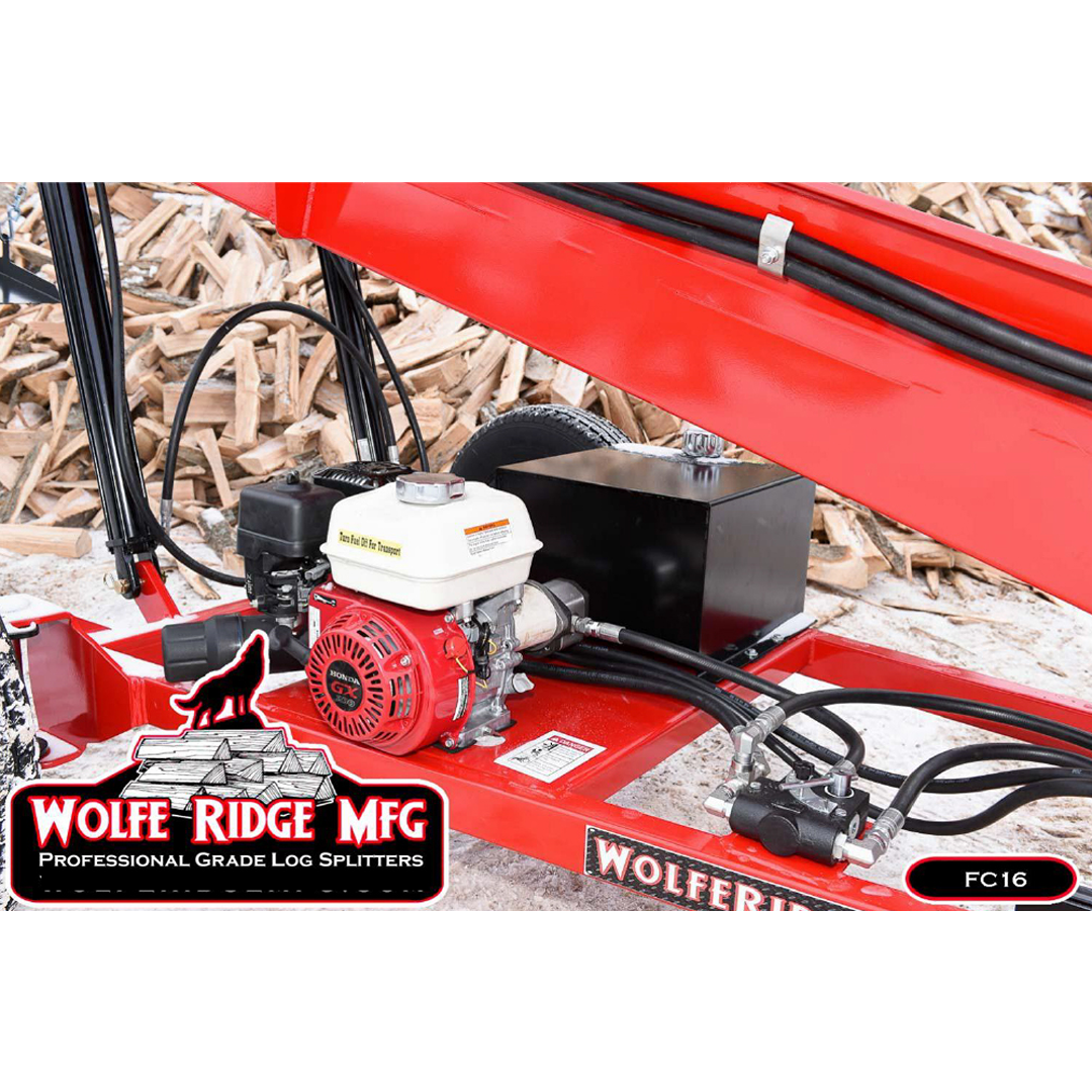 Close-up of red firewood conveyor engine and hydraulic components surrounded by stacked split logs outdoors