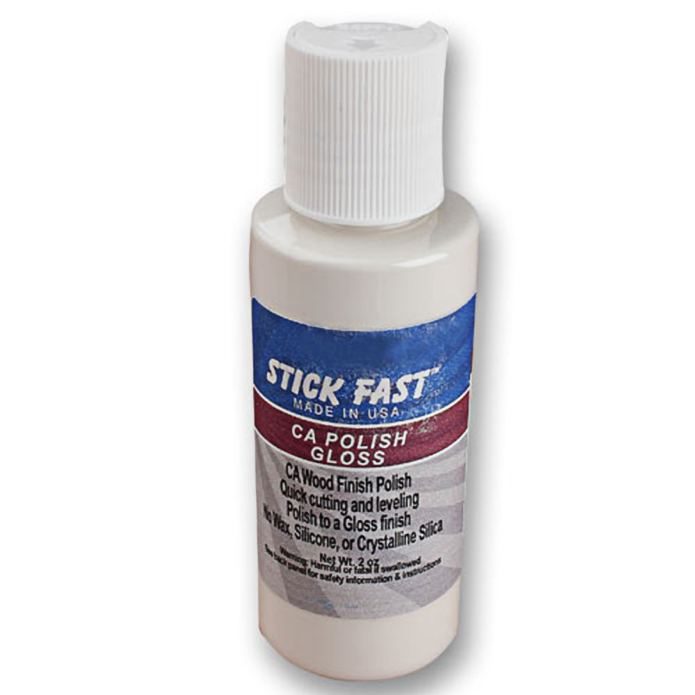 Small white bottle of Stick Fast CA Wood Polish with blue and red label for glossy wood finishing and leveling
