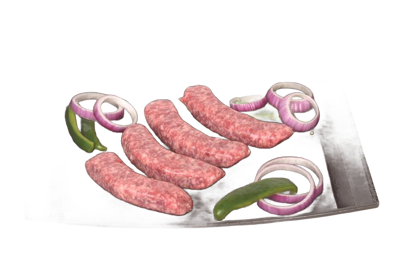Rectangular Lodge cast iron baking and serving platter with raw sausages, sliced onions, and green peppers on top