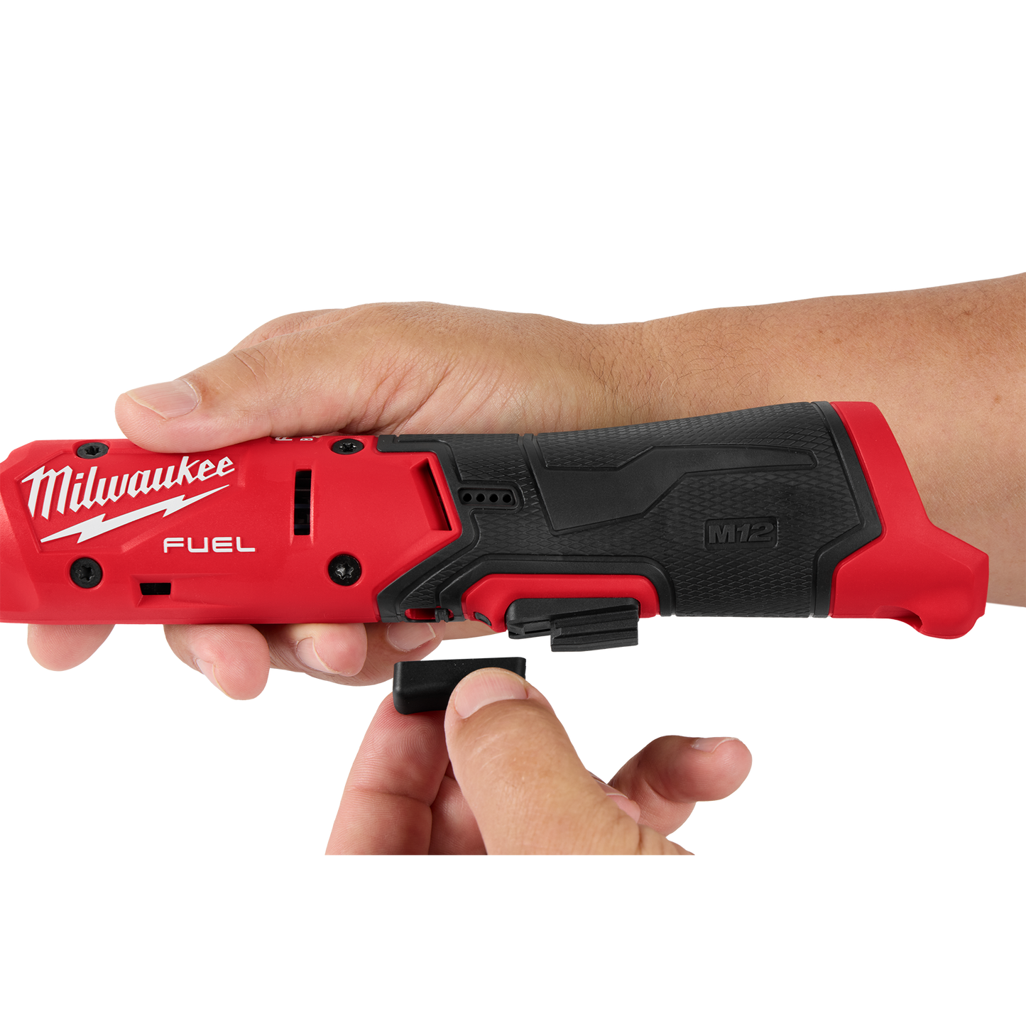 Hands adjusting the belt clip on a red and black Milwaukee cordless ratchet, part of Hand Tools, Woodworking Tools, and Sockets & Ratchets at Hartville Hardware.