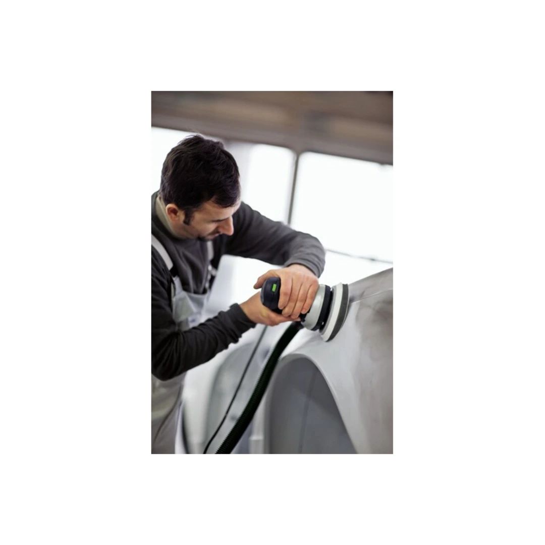 Man using a power sanding tool on a smooth curved surface, part of woodworking tool accessories collection