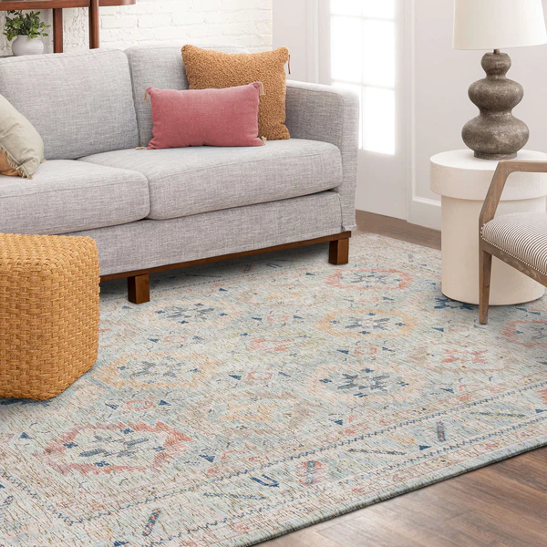 Soft multi-colored area rug with intricate patterns in a cozy living room setting for home improvement décor