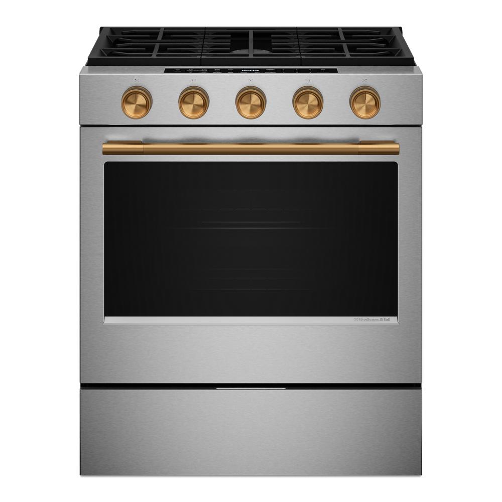 stainless steel slide-in gas range with brass knobs and handle for kitchen and home improvement