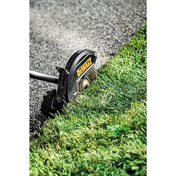 DEWALT power head edger cutting grass along pavement edge for precise lawn maintenance in outdoor tools collection