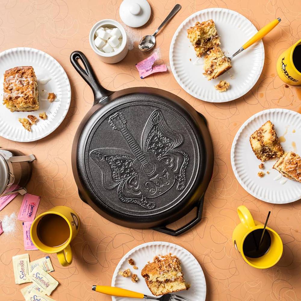 Cast iron skillet with raised butterfly and guitar design, durable cookware for kitchenware and Lodge Cast Iron collection