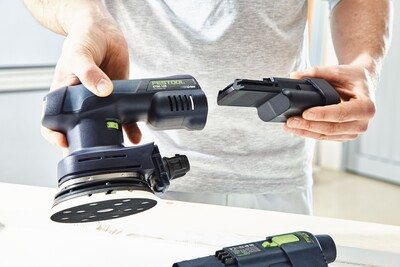 Cordless Festool eccentric sander with removable battery for efficient tools and home improvement projects
