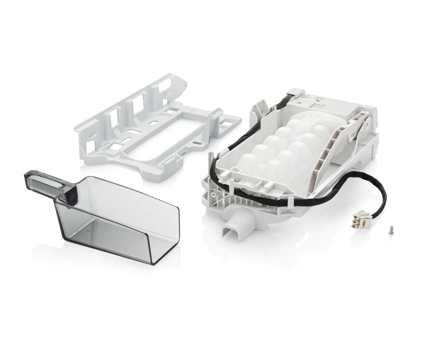 White plastic multi-door ice maker kit components with wiring and clear ice scoop from appliance parts collection