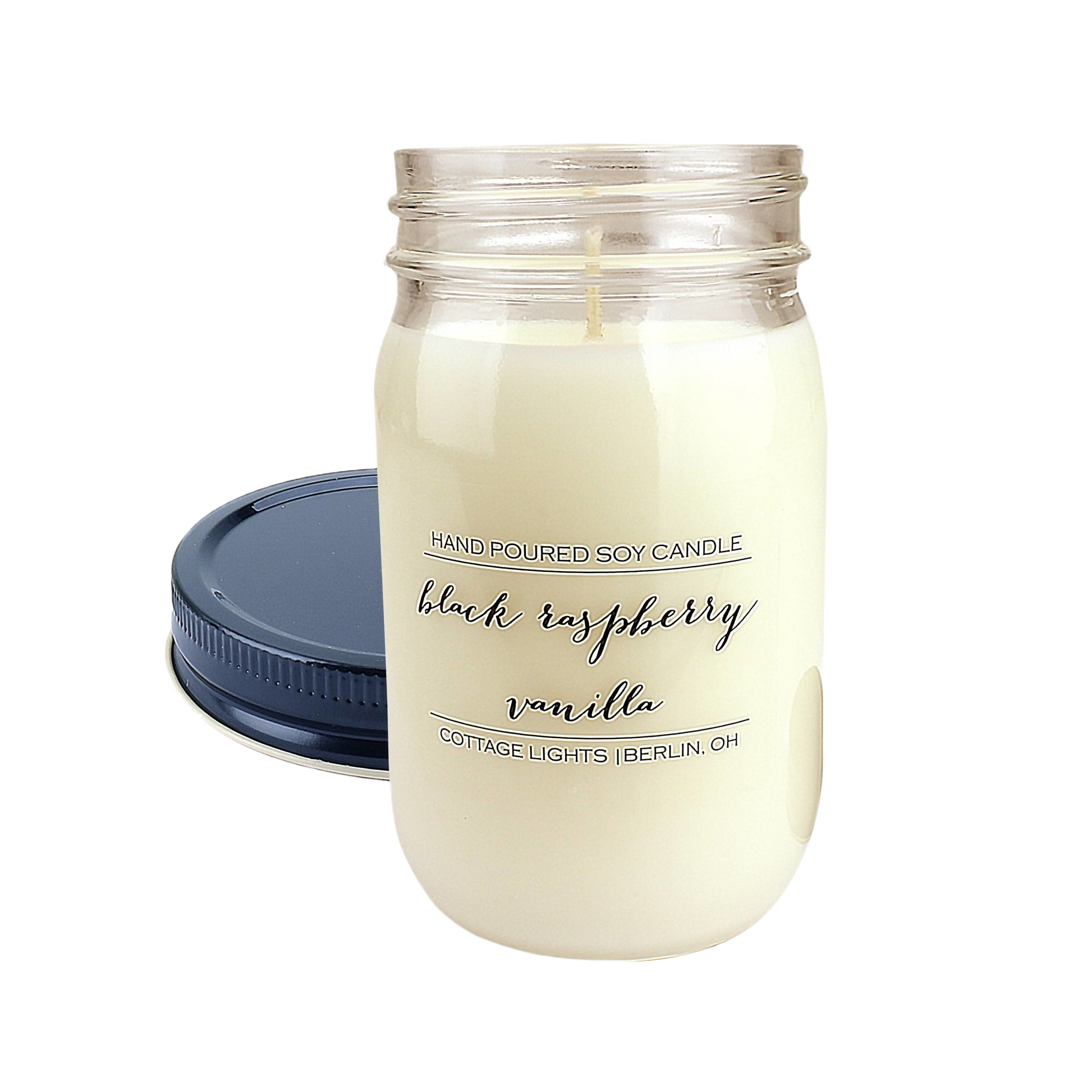 16 oz. hand poured soy candle in clear glass jar with black lid, scented with black raspberry vanilla for home ambiance