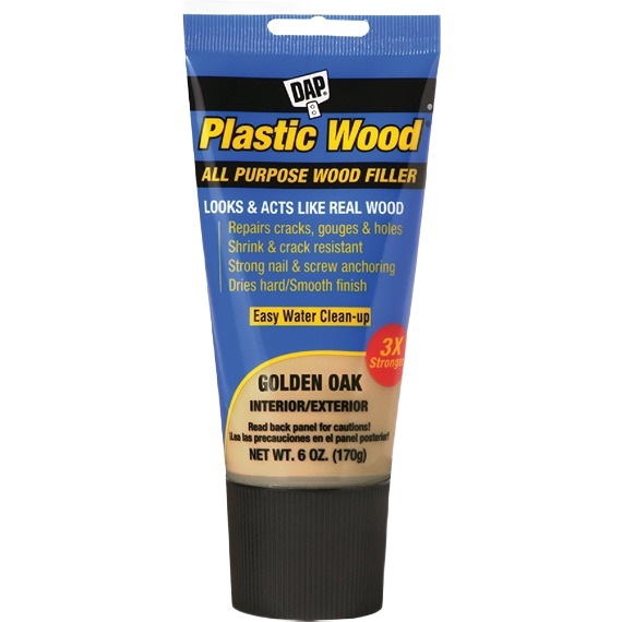 Tube of golden oak colored all purpose wood filler for home improvement and repair projects