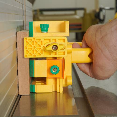 Yellow push block with adjustable force technology and ergonomic handle for precise woodworking in power tool accessories collections