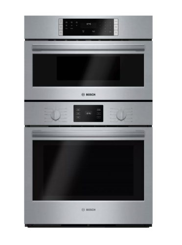 Stainless steel combination wall oven with digital display and metal knobs in kitchen appliances collection