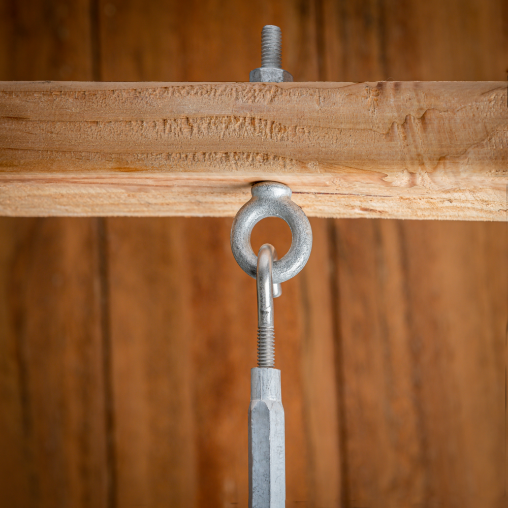 Galvanized eye bolt with shoulder and hex nut securing hardware to lumber for home improvement and fasteners under $50 collections