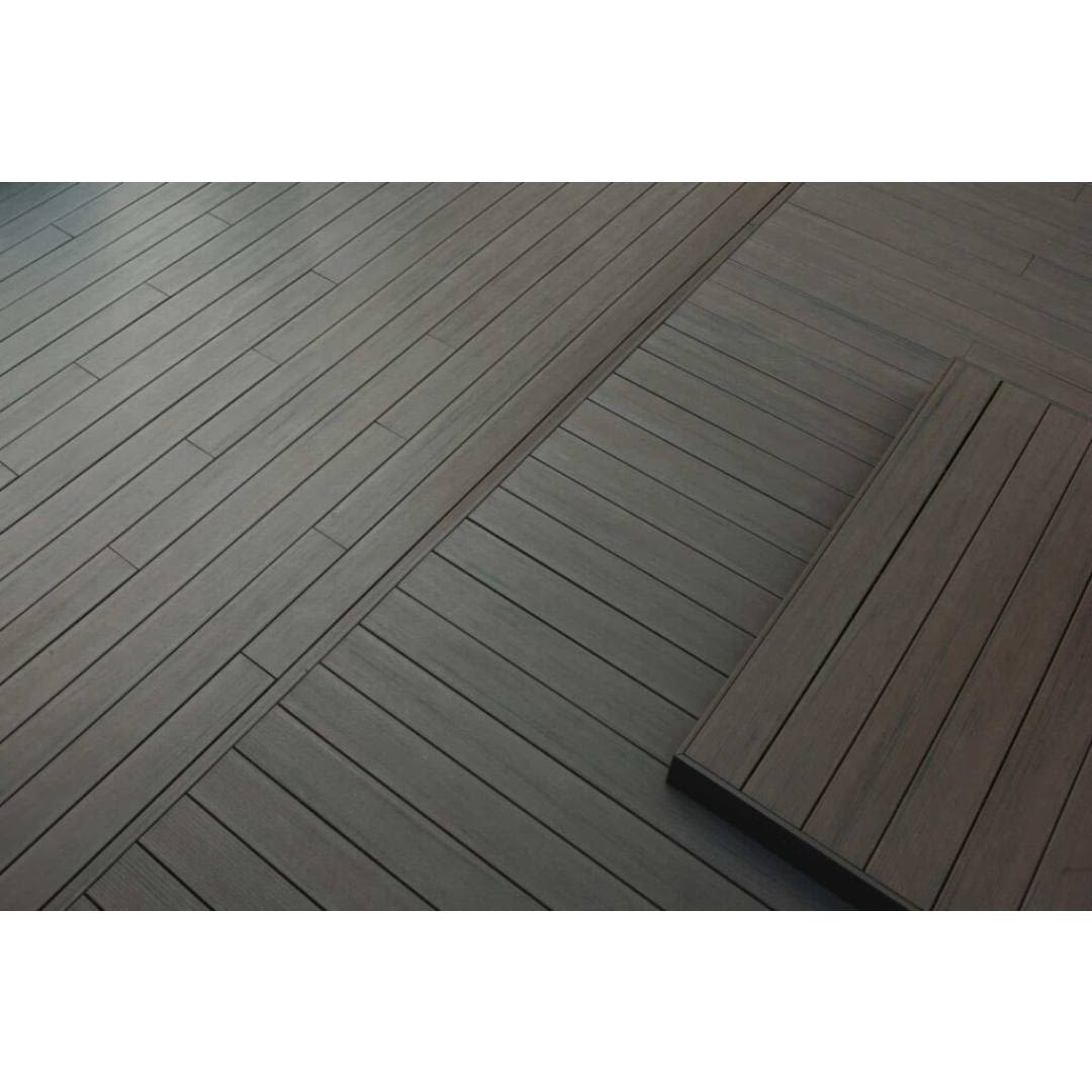 Espresso brown composite decking boards with square shoulder edges arranged for outdoor home improvement projects
