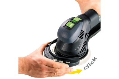 Person securing sanding disc onto Festool multi-mode sander for tools and home improvement tasks