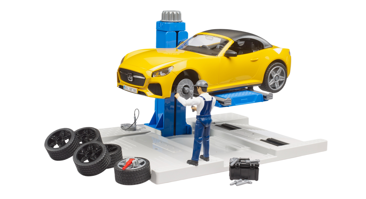 Yellow toy sports car raised on blue car lift with mechanic figure and spare tires in car service playset