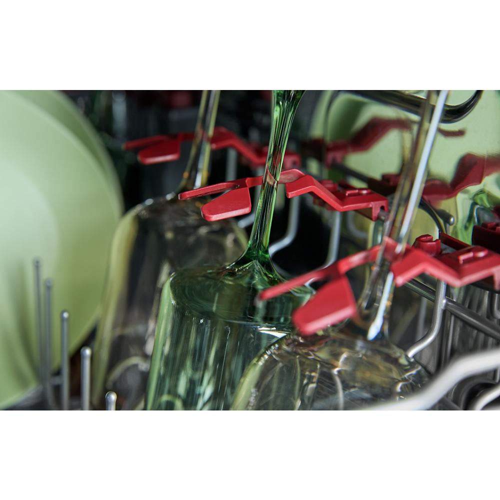 Close-up of glassware secured by red holders inside a KitchenAid dishwasher rack from Dishwashers collection