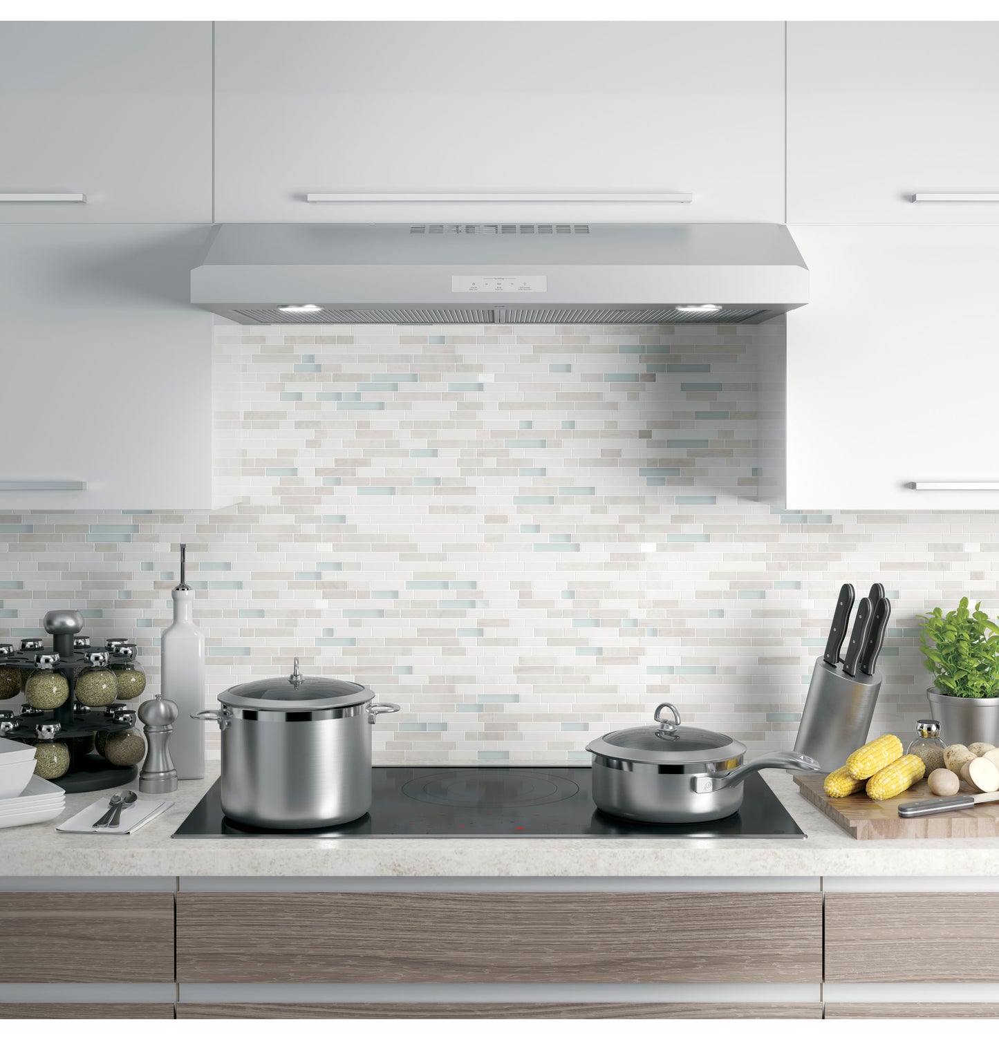 Under cabinet stainless steel range hood with built-in lights and control panel in kitchen appliances and home improvement collection