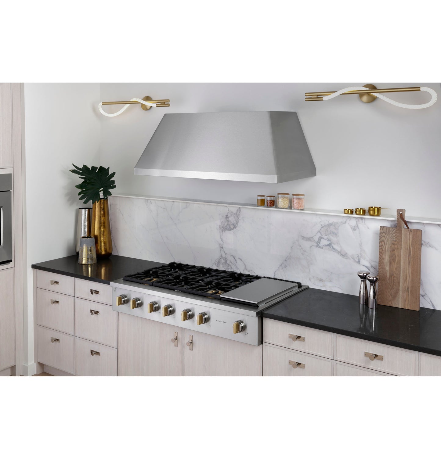 Modern kitchen with stainless steel rangetop featuring six burners and built-in griddle in Cooktops and Kitchen & Kitchenware collections