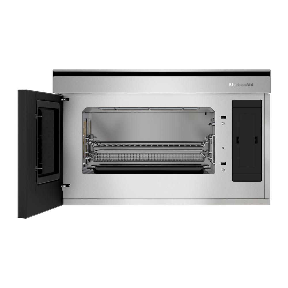 Built-in convection microwave oven with stainless steel finish and open door showing interior racks and trays