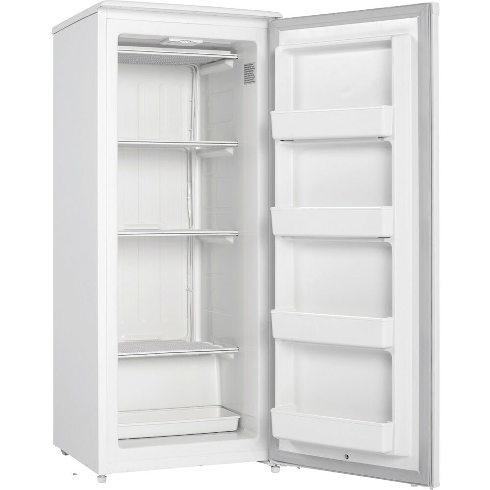 White upright freezer with manual defrost, mechanical thermostat, and multiple interior shelves for kitchen and appliance use