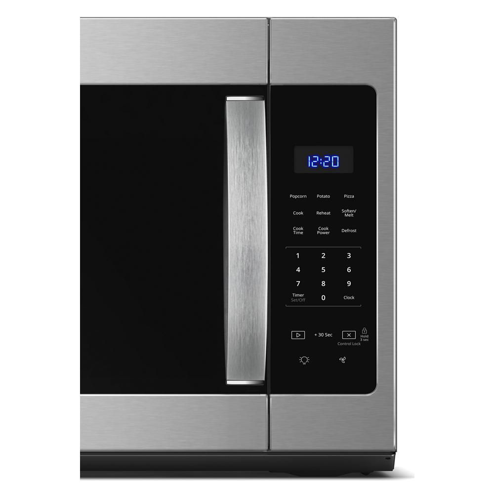 Close-up of stainless steel microwave hood combo featuring blue digital clock and electronic touch control panel from Microwaves collection