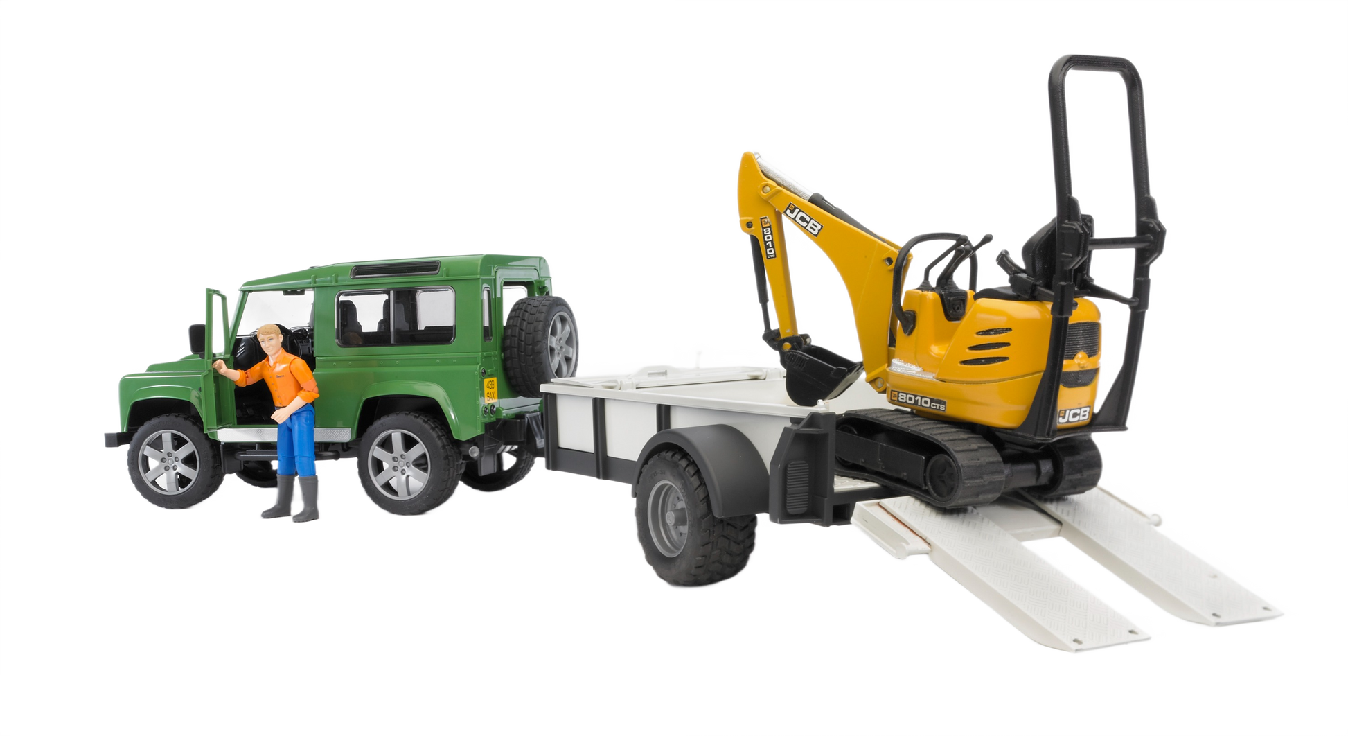 Green Land Rover Defender toy with detachable white trailer carrying yellow JCB micro excavator from Bruder Toys collection