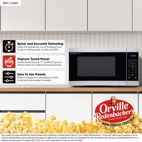 Stainless steel microwave oven on kitchen counter with digital display and preset function icons from microwaves collection