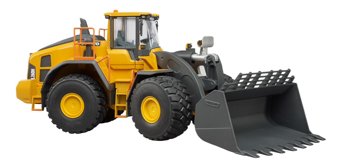 Yellow Bruder Volvo wheel loader toy with detailed cabin and large black bucket for realistic construction play