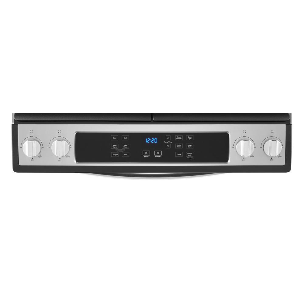 Control panel of stainless steel gas range with digital display and four burner control knobs from Ranges & Kitchenware collection
