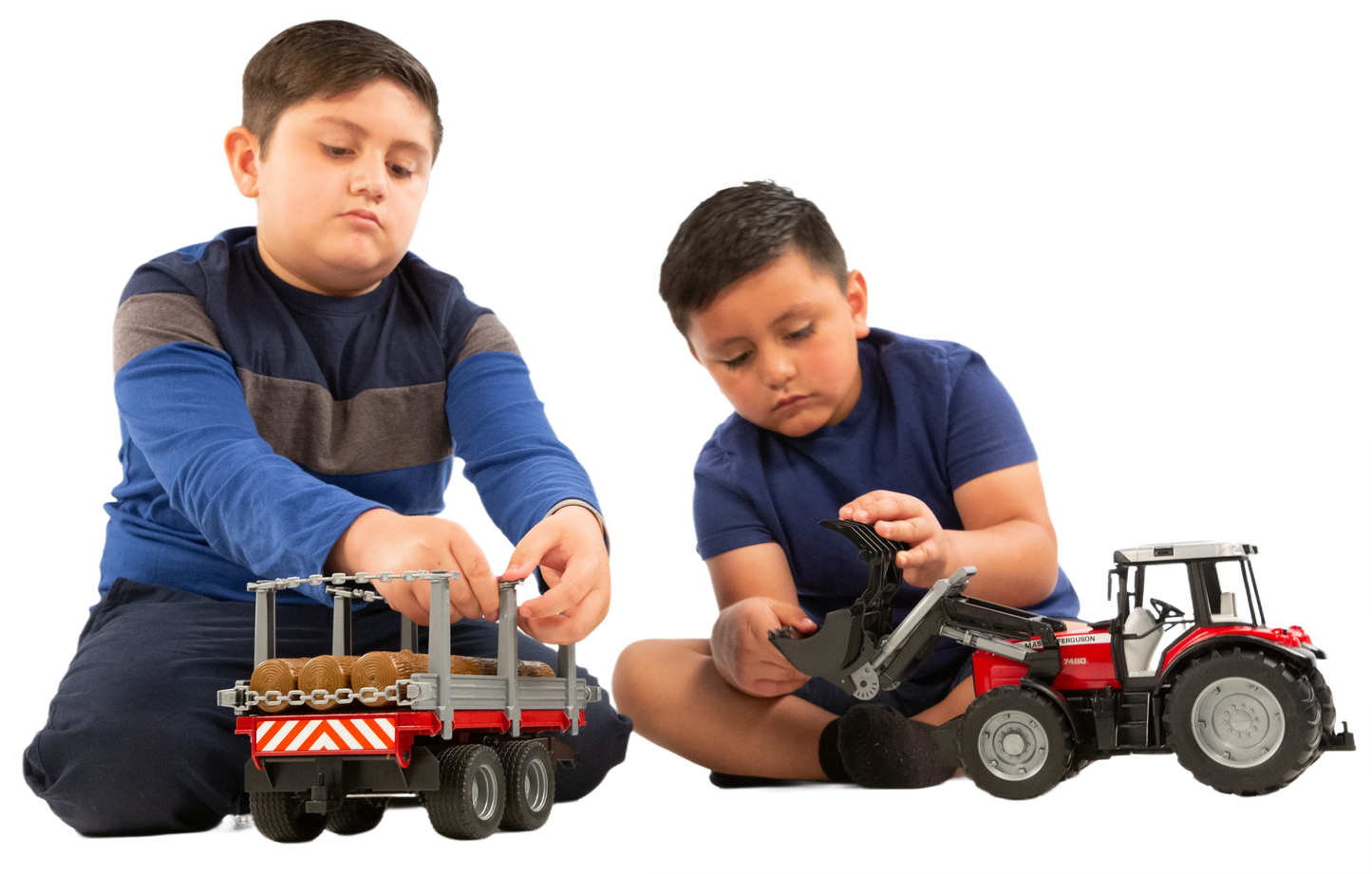 Two boys playing with Bruder Toys Massey Ferguson tractor and logging trailer in Vehicles & Remote Controlled Toys collection