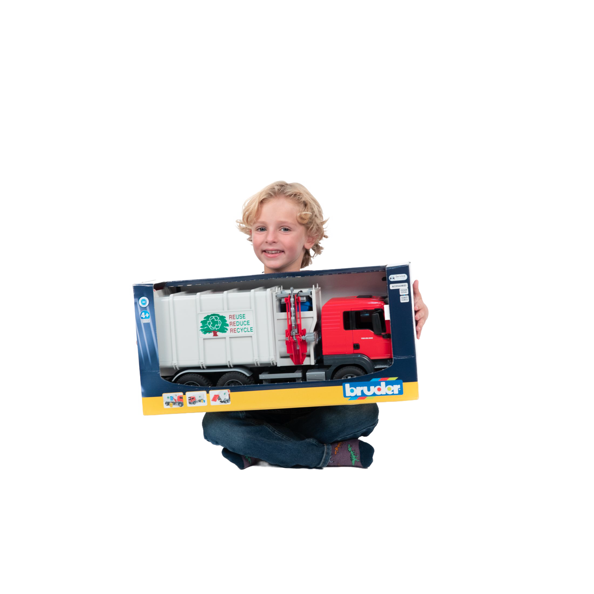 Child holding boxed Bruder red and white side loading garbage truck toy from Vehicles & Remote Controlled Toys collection