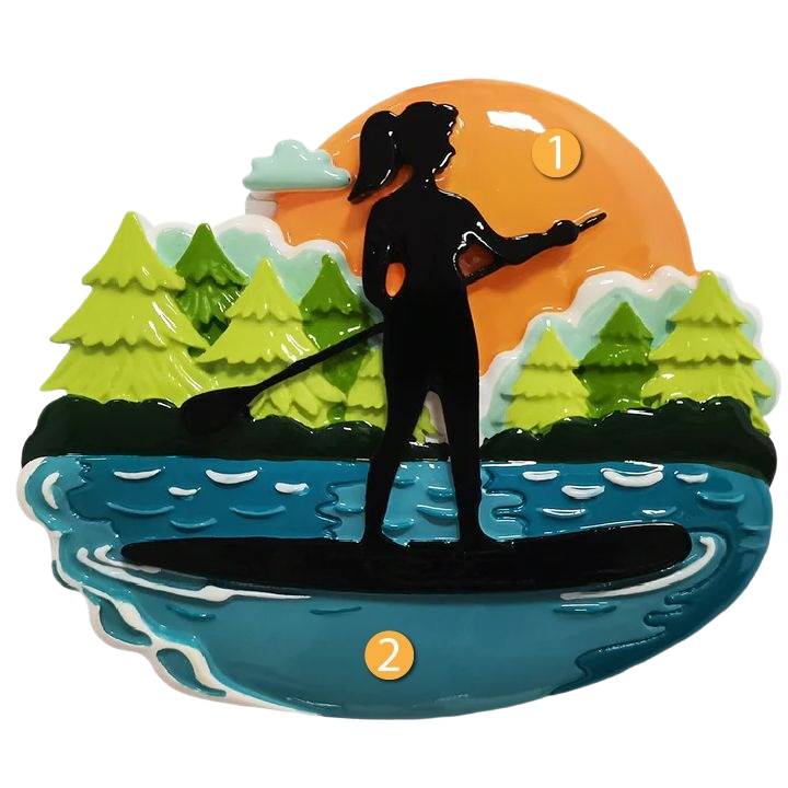 Silhouette of female paddle boarder on water with pine trees and orange sunset in Christmas Ornaments & Tree Decorations collection