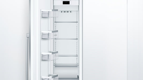 Built-in freezer with flat hinge, sleek white interior and adjustable shelving for organized kitchen storage
