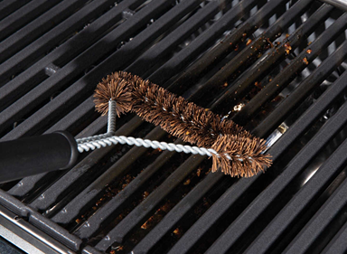 Extra wide grill brush with natural stiff palmyra bristles for deep cleaning grills in outdoor living and grilling tools