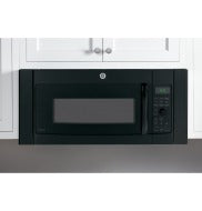 Black built-in over-the-range microwave with digital keypad and ventilation installed between white cabinets