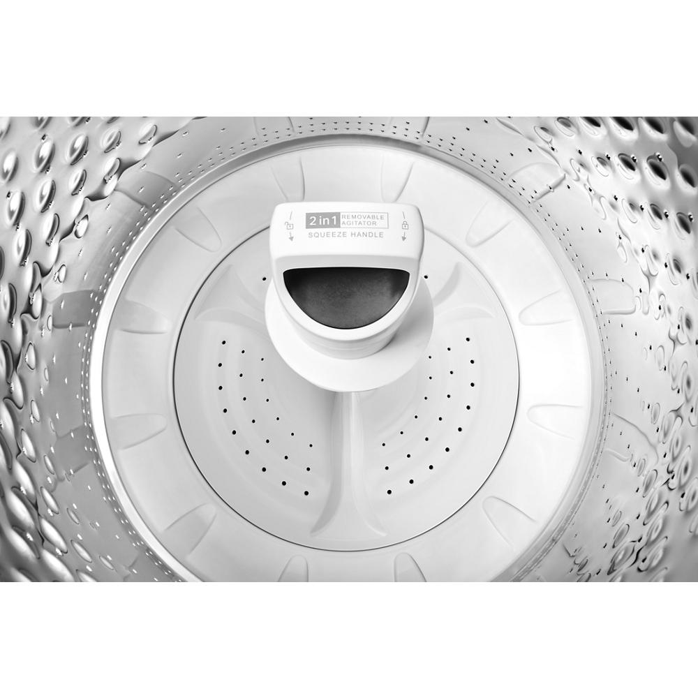 Interior of a top load washer drum featuring a removable 2-in-1 agitator for versatile washing options in appliances collection