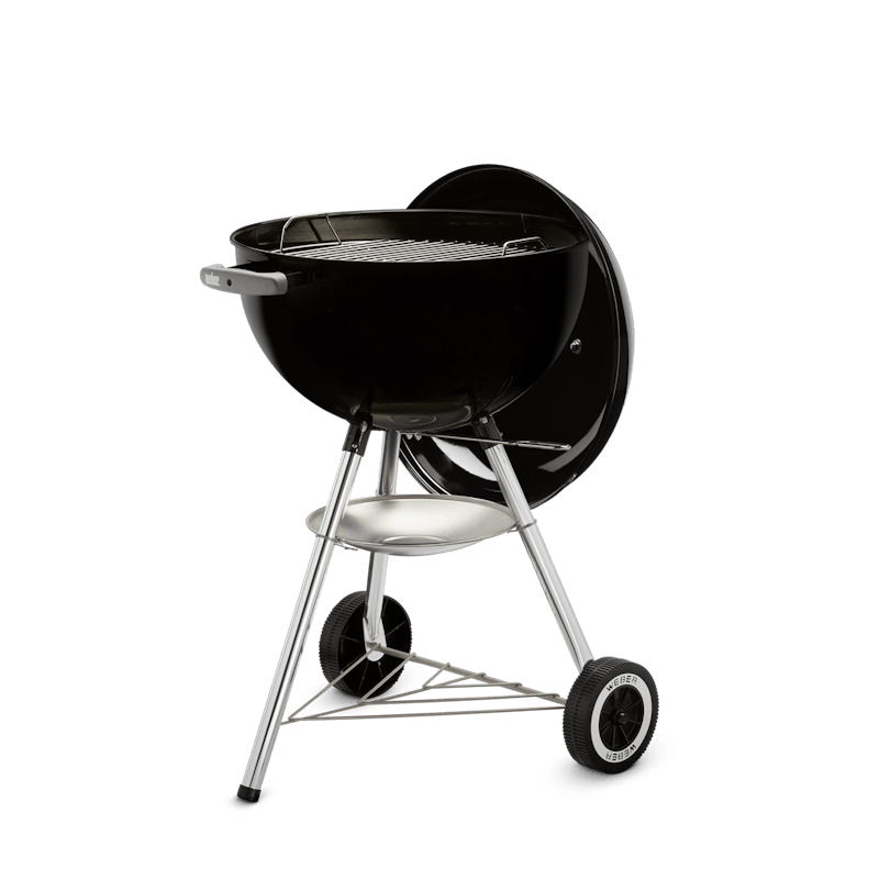 Black charcoal kettle grill with porcelain-enameled bowl, vented lid, and wheeled legs for outdoor cooking and grilling collections