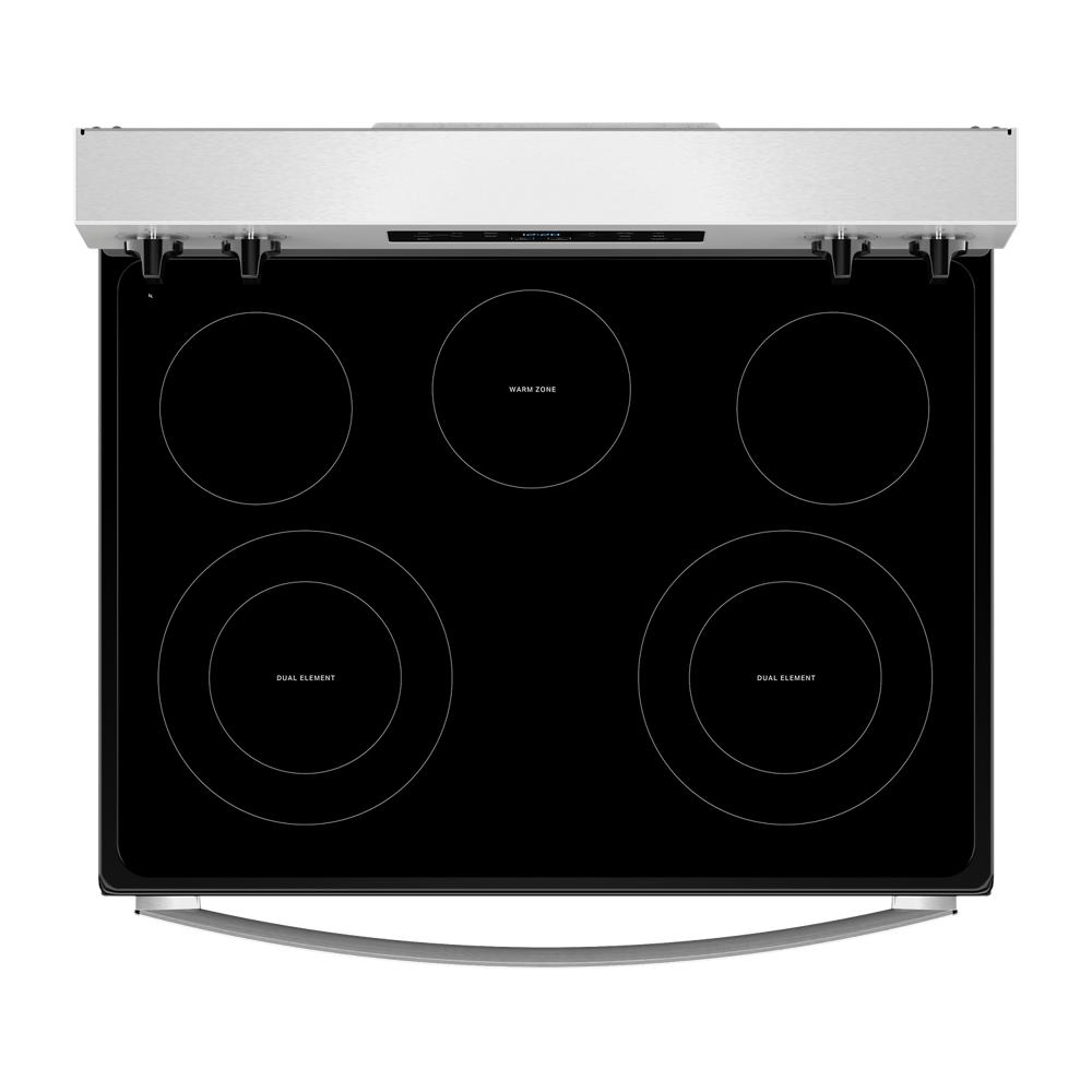 Top view of smooth black glass electric cooktop with five heating elements from Ranges and Kitchen collections